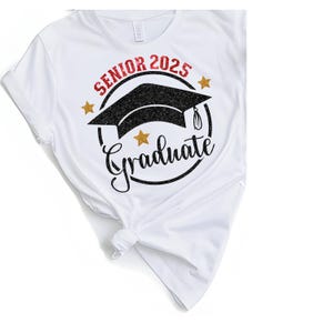 May include: White t-shirt with a black and gold glitter design that says "Senior 2025 Graduate" with a graduation cap graphic.