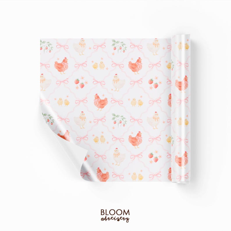 May include: A roll of white wrapping paper with a repeating pattern of chickens, chicks, strawberries, and pink bows. The text "BLOOM Artistry" is at the bottom. The paper is partially unrolled, revealing the pattern.