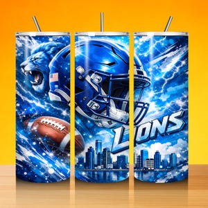 May include: A set of three stainless steel tumblers with a Detroit Lions theme. Each tumbler features a blue lion, football helmet, and the word "Lions" over a city skyline, all set against a blue and white lightning background.