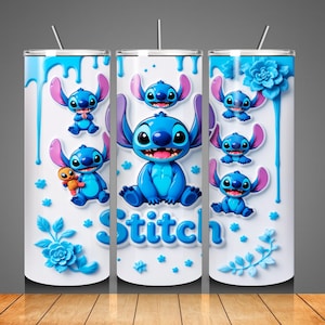 May include: A white tumbler featuring the character Stitch from Lilo & Stitch. The design includes multiple images of Stitch in various poses, blue floral accents, and the word "Stitch" in blue. The tumbler has a blue lid and a straw.