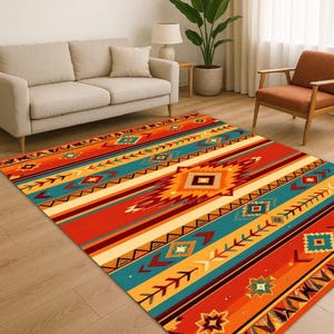 Peut inclure: Un tapis rectangulaire avec un motif du Sud-Ouest. Le tapis présente une palette de couleurs vibrantes d'orange, de rouge, de turquoise et de jaune. Des motifs géométriques et des rayures créent un design audacieux. Le tapis est posé sur un parquet.