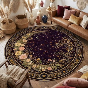 May include: A circular rug with a deep purple backdrop, adorned with a floral and celestial motif. The rug has a gold edge and a central design of flowers, stars, and a crescent moon. It's positioned on a wooden floor in a living room.