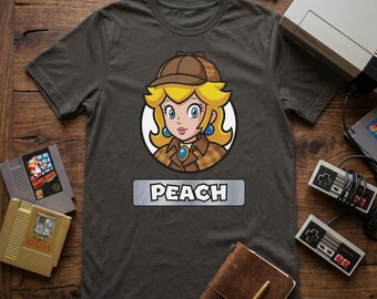 Detektiv Peach Mystery Tee | Retro Arcade Heldin Bekleidung | Klassisches Spiel Prinzessinnen Geschenk