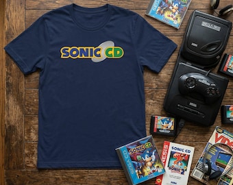Sonic CD Grafik-T-Shirt | Little Planet Retro Gaming Shirt | 90er Jahre Sega CD inspiriertes Kleidungsstück