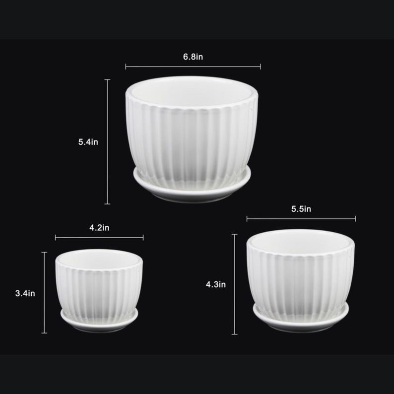 May include: Three white ceramic planters with matching saucers. The largest planter is 6.8 inches wide and 5.4 inches tall. The medium planter is 5.5 inches wide and 4.3 inches tall. The smallest planter is 4.2 inches wide and 3.4 inches tall.