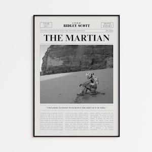 May include: Black and white framed movie poster for "The Martian" by Ridley Scott. The poster features a seated astronaut on a sandy surface. The poster includes the text "THE MARTIAN" and the quote "I'M GOING TO HAVE TO SCIENCE THE SHIT OUT OF THIS."