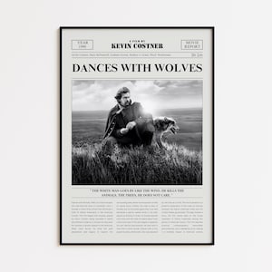 May include: Black and white framed movie poster for "Dances With Wolves" featuring Kevin Costner. The poster has a newspaper-style layout with the film's title, credits, and a still image of Costner with a wolf. The text reads "The White Man Goes By Like The Wind. He Kills The Animals, The Trees, He Does Not Care."