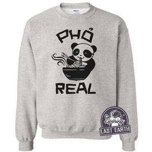 May include: A grey sweatshirt with a black graphic of a panda eating pho. The text "Pho Real" is printed below the panda.