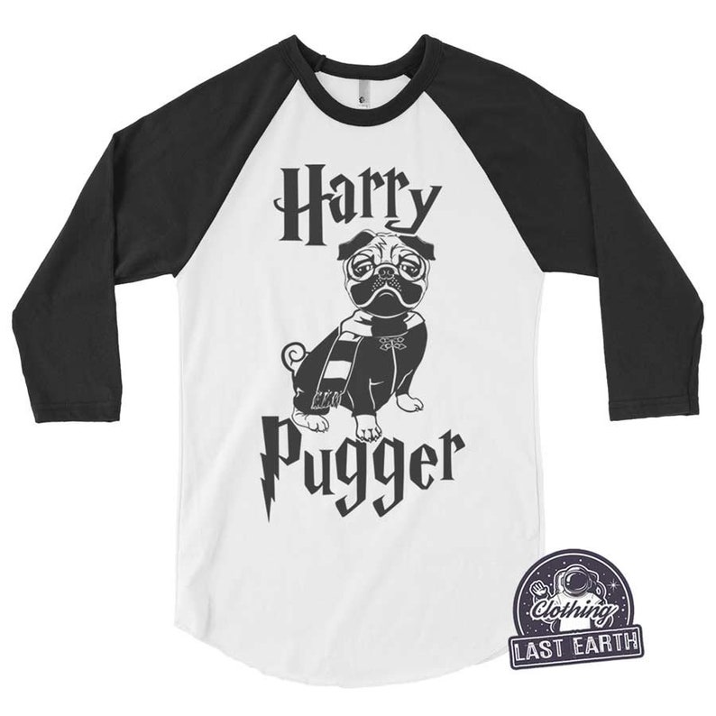 May include: White and black baseball tee shirt with a black and white illustration of a pug wearing glasses and a scarf. The text "Harry Pugger" is printed on the shirt.