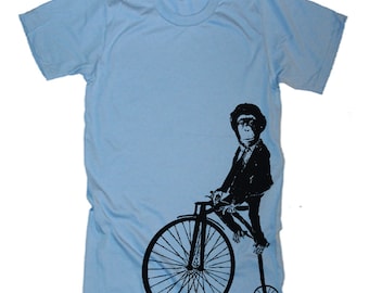 Camiseta con mono montando en bicicleta, regalo divertido para amantes de los animales.