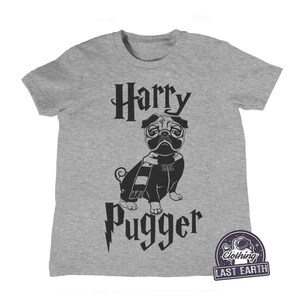 May include: Gray t-shirt with a black graphic of a pug wearing glasses and a scarf. The text "Harry Pugger" is printed below the pug.