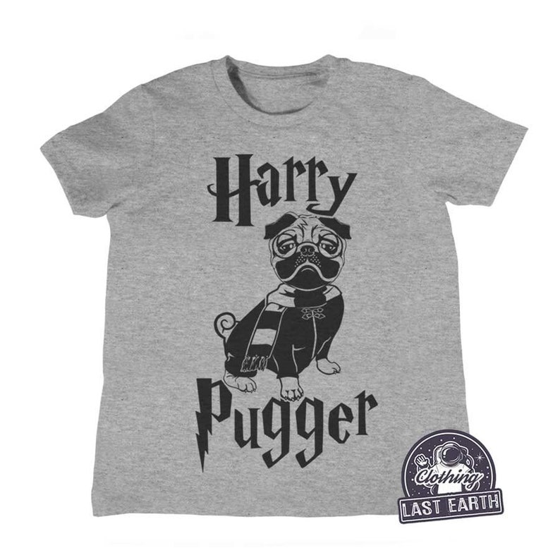 May include: Gray t-shirt with a black graphic of a pug wearing glasses and a scarf. The text "Harry Pugger" is printed below the pug.