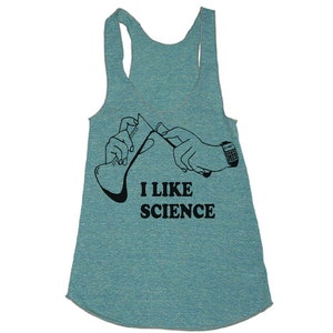May include: A teal blue tank top with a black graphic of a hand holding a beaker and a calculator with the text "I LIKE SCIENCE".