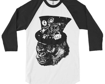 May include: A white and black baseball tee shirt with a black and white illustration of a gorilla wearing a top hat with gears and clock faces.