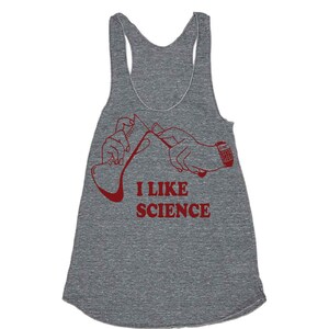 May include: Gray tank top with a red graphic of two hands holding a beaker and the text "I LIKE SCIENCE".