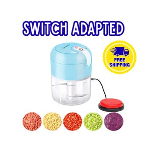 May include: A light blue electric food chopper with a clear container and internal metal blades, connected by a black cord to a round red push-button switch. The text "SWITCH ADAPTED" appears above, with five circular samples of chopped food below.