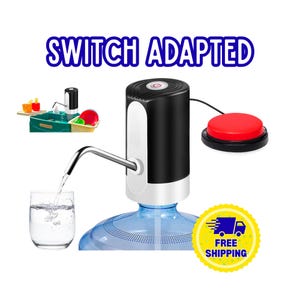 May include: A black and white electric water dispenser pump with a metal spout, connected to a red circular push-button switch. The text "SWITCH ADAPTED" appears at the top, and a small inset shows the pump in use. A glass of water is below.