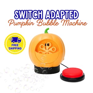 May include: A switch adapted bubble machine shaped like an orange pumpkin with a green stem. The device features a black base and a connected red circular push button switch. The text SWITCH ADAPTED Pumpkin Bubble Machine is visible above.