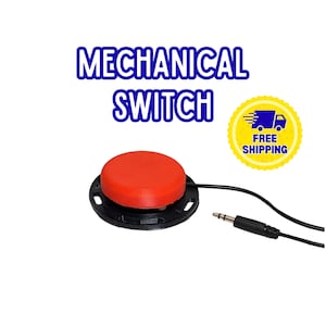 May include: A mechanical switch with a large, round red button. The switch is black and has a black cable with a 3.5mm jack. The text "MECHANICAL SWITCH" is above the switch in blue and white.