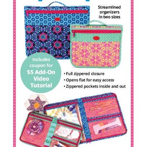 May include: Zip It Up 2.0 organizers in two sizes featuring blue and pink geometric patterns with zippered closures. The interior displays multiple clear zippered pockets containing various craft supplies, including pencils, a pincushion, and notions.