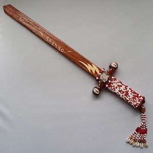 Santeria Yoruba wooden sword for SHANGO orisha . Espada de madera para CHANGO. Santa Barbara