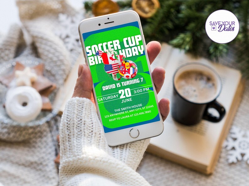 May include: A smartphone displays a soccer-themed birthday invitation. The invitation features a green background with the text "SOCCER CUP BIRTHDAY" and details for the event, including the date, time, and location. Flags of various countries are also displayed.