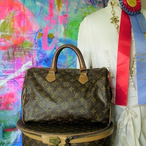 louis vuitton handbolsas saks