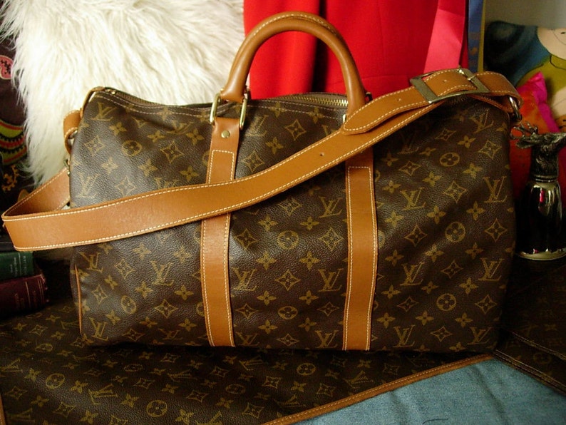 Louis Vuitton Duffle Bag Saks Fifth Avenue Plus
