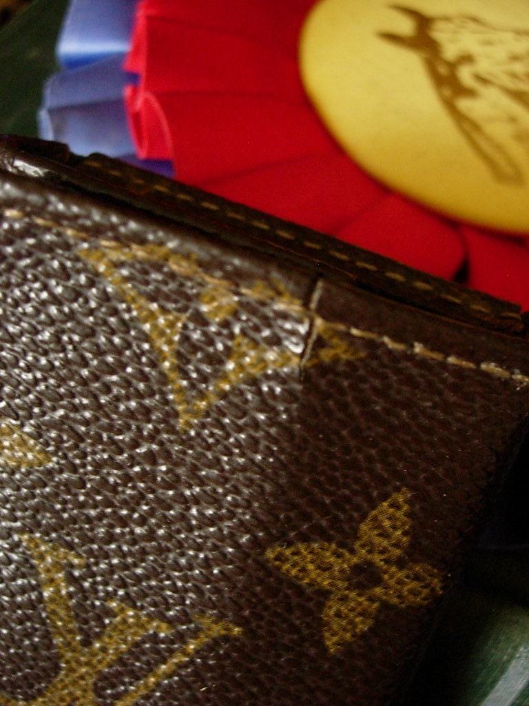 Louis Vuitton Rare Limited Edition Damier Ebene Keychain Bag Charm White  gold Metal ref.293720 - Joli Closet