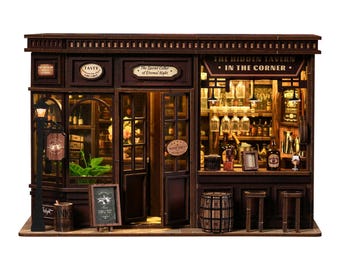 May include: A detailed miniature wooden tavern model. The model features a bar, tables, and a sign that reads "The Hidden Tavern - In The Corner." The model also includes a street lamp and a sign that reads "Tasty."