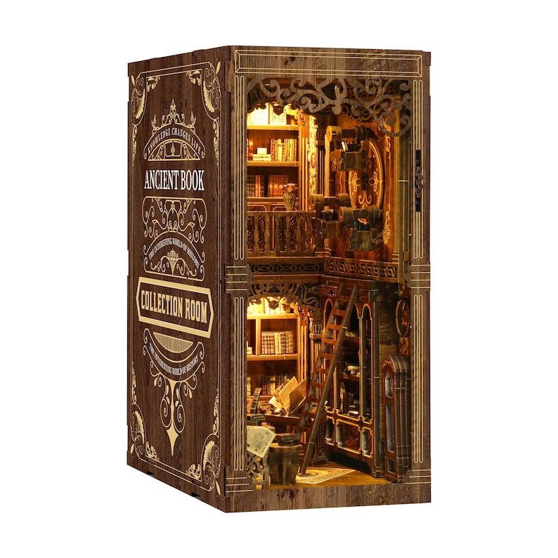 May include: A wooden bookshelf diorama with the words "Ancient Book Collection Room" on the side. The interior features miniature bookshelves, a ladder, and warm lighting, creating a cozy, inviting atmosphere. The diorama is intricately detailed with ornate carvings.