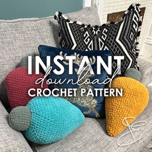 May include: Crochet pattern for light bulb shaped pillows. The pillows are in red, blue, yellow and gray. The text on the image reads "INSTANT download CROCHET PATTERN".