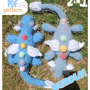 May include: Two crocheted blue plush toys with white wings and colourful accents. One is a lighter blue, the other a darker blue. The image includes text that says "PDF pattern", "2 in 1", "Bundle!", "fluffy?", and "original?".