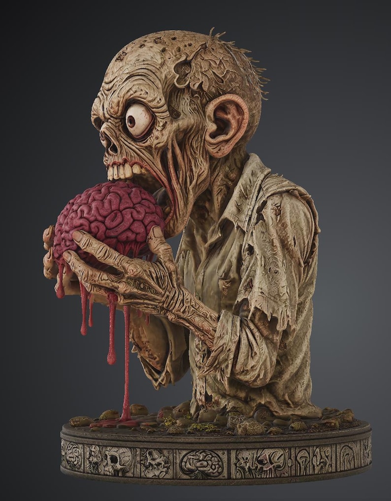 Puede incluir: Un busto detallado de una figura zombi con piel p&aacute;lida y texturizada, ojos muy abiertos y la boca abierta mordiendo un cerebro rosa. La figura viste una camisa desgarrada de color claro y se apoya sobre una base circular con motivos de calaveras.