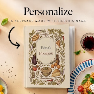 May include: A hardcover recipe book with a cream-colored cover featuring a botanical border of herbs, vegetables, and bread. The text reads "Personalize", "A KEEPSAKE MADE WITH HER/HIS NAME", and "Edna's Recipes". A black arrow points to the book.