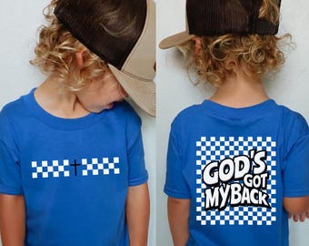 Camiseta cristiana infantil "Dios me respalda", regalo para la escuela dominical, camiseta con cruz a cuadros, ropa urbana con temática religiosa, prenda juvenil religiosa.