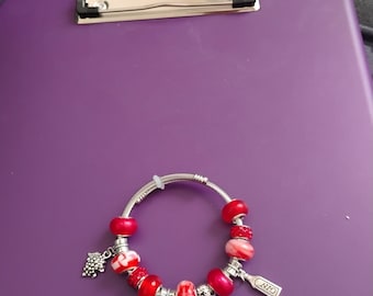 Red beaded charm bracelet