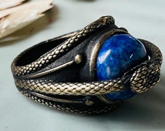 Wheel of Time Aes Sedai Serpent Ring | Antique Brass Ouroboros Blue Stone