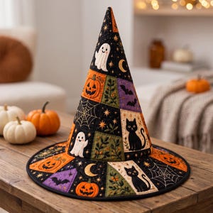 May include: A quilted witch hat featuring a patchwork design with Halloween motifs including orange jack-o'-lanterns, white ghosts, black cats, purple bats, yellow crescent moons, spider webs, and green foliage on a black background.