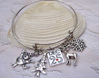Pulsera expandible con dijes de plata con temática navideña