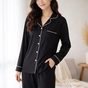 May include: A set of three ceramic mugs with a speckled, matte finish. The mugs are in shades of cream, light gray, and dark gray. Each mug has a simple, minimalist design, perfect for coffee or tea.