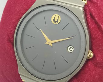 Vintage Bulova quartz herenhorloge grijze wijzerplaat Zwitsers analoog retro collectible jurk polshorloge