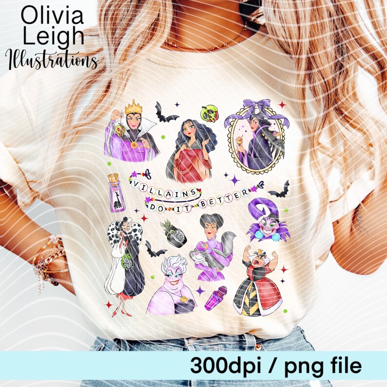May include: Cream-colored t-shirt featuring colorful illustrations of various cartoon villains, with the text "Villains Do It Better." The design includes images of evil queens and other characters, along with bats and stars. The text "Olivia Leigh Illustrations" is at the top.