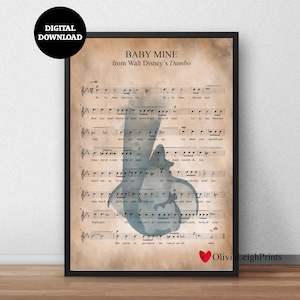 May include: A vintage-style printable sheet music for the song "Baby Mine" from Disney's Dumbo. The sheet music features a blue silhouette of Dumbo's mother. The text "Baby Mine from Walt Disney's Dumbo" is at the top of the sheet music. The text "OliviaLeighPrints" is at the bottom of the sheet music.
