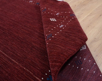 Tappeto Gabbeh in lana rossa intrecciata a mano con motivo a bordo minimo, tappeto moderno fatto a mano, solido e strutturato