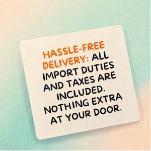 May include: A square white card with rounded corners featuring orange and black text that reads: HASSLE-FREE DELIVERY: ALL IMPORT DUTIES AND TAXES ARE INCLUDED. NOTHING EXTRA AT YOUR DOOR. The card is set against a soft, gradient pastel background.
