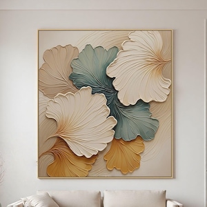 Peut inclure: Tableau encadré avec un motif en relief 3D de feuilles stylisées dans des tons beige, blanc, vert d'eau et or. L'œuvre d'art texturée est posée sur un fond neutre. Le cadre est doré.
