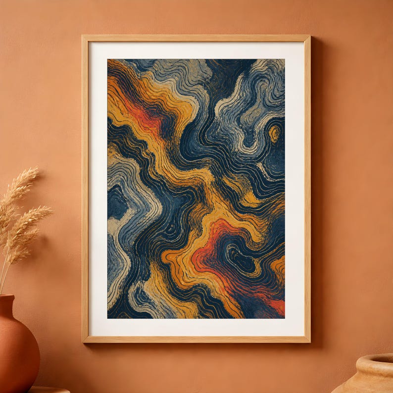 May include: A framed wall art print featuring an abstract pattern of flowing, wavy lines in shades of deep navy blue, golden yellow, and burnt orange. The artwork is encased in a light-toned wooden frame with a white mat border surrounding the print.