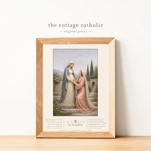 Puede incluir: Impresi&oacute;n digital enmarcada que presenta una ilustraci&oacute;n religiosa de dos mujeres con t&uacute;nicas fluidas, ambientada en un jard&iacute;n. La impresi&oacute;n est&aacute; en un marco de madera clara, con el texto "the cottage catholic - digital print -" en la parte superior.