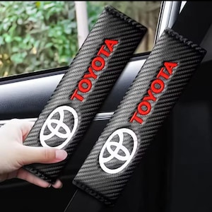 Brand New Toyota  Seat Belt Cover Set Protector + Free Badge Corolla Yaris GR86 Supra Huilex Rav4